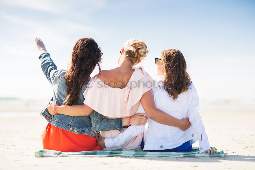 Similar – Group of best friends cheerful on the beach in sunset