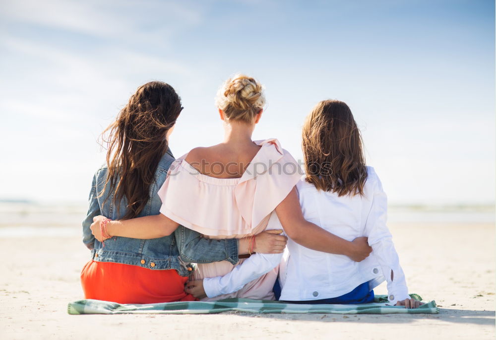 Similar – Group of best friends cheerful on the beach in sunset