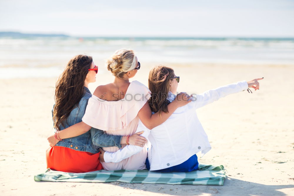 Similar – Group of best friends cheerful on the beach in sunset