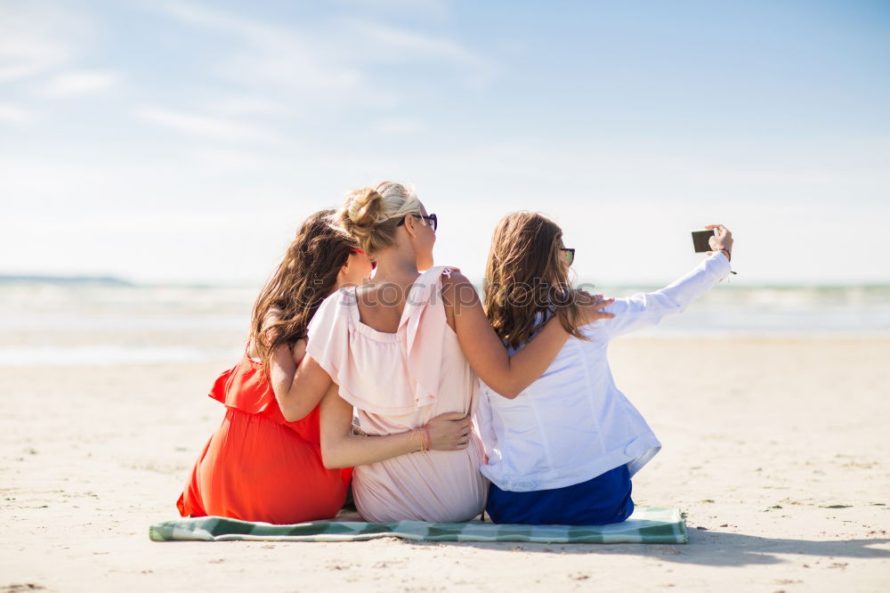 Similar – Group of best friends cheerful on the beach in sunset