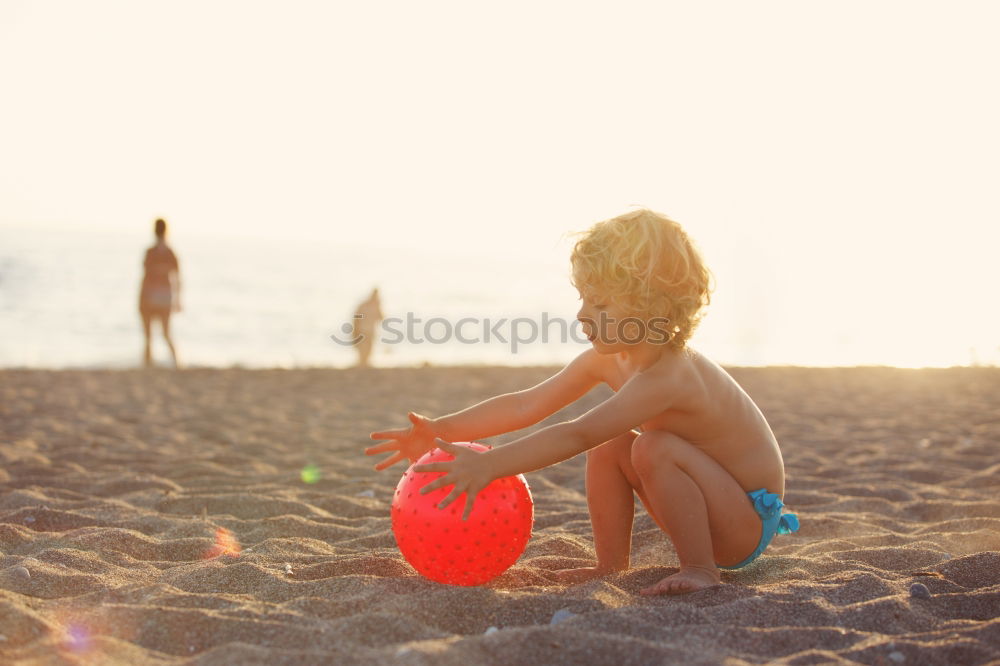 Similar – Building sandcastles by the sea