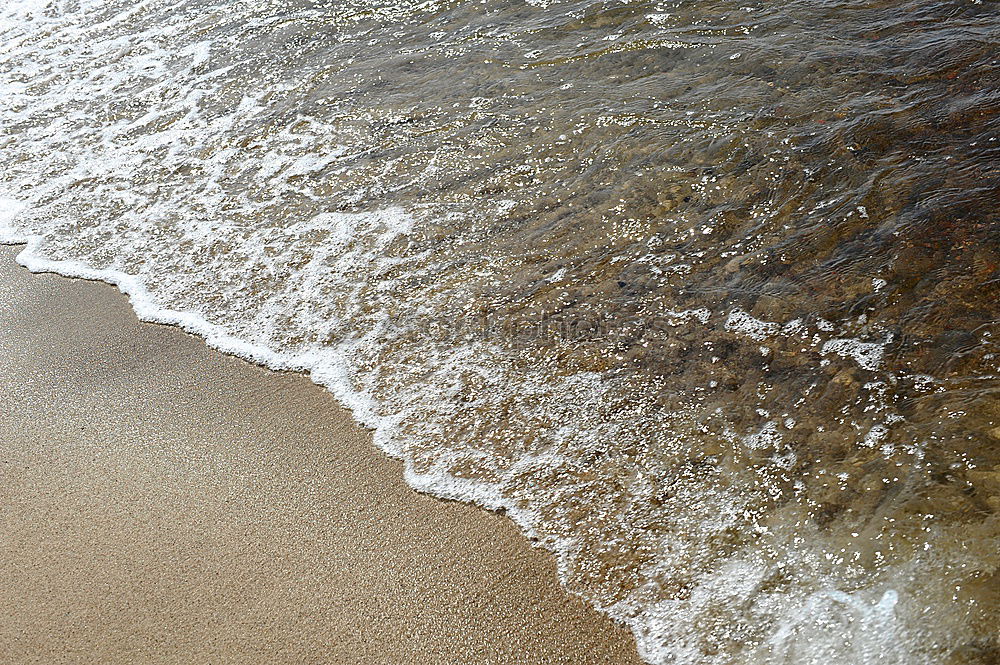 Similar – Sea foam at 30°C Summer