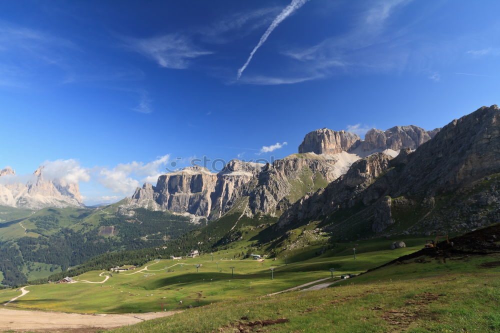 Similar – Image, Stock Photo Clouds and shadows in the Dolomites with path in portrait format