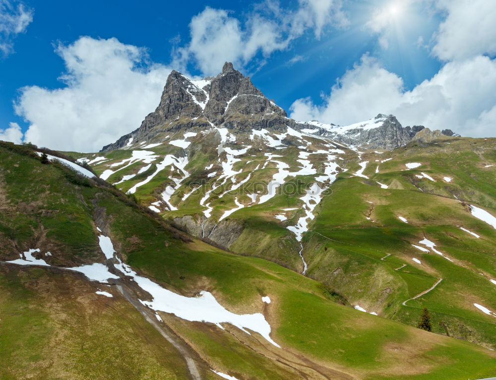 Similar – Swiss mountain peak Summer