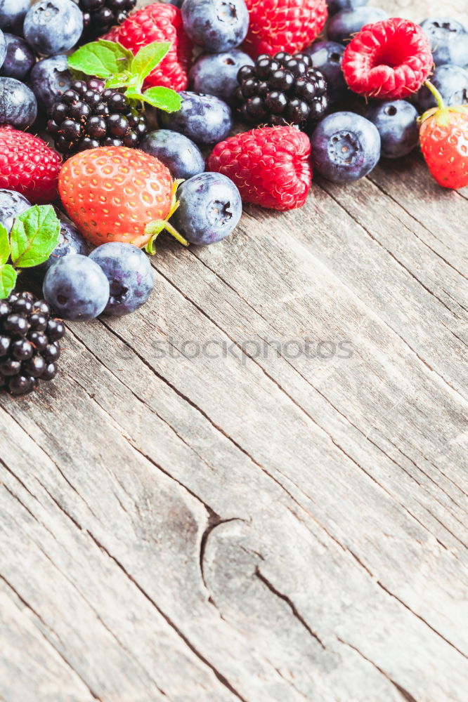 Similar – Image, Stock Photo Blue and raspberries on slate plate