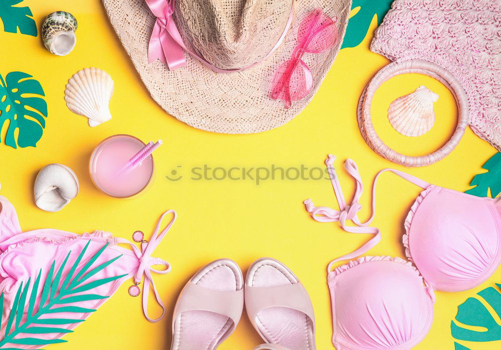 Similar – Straw hat with sunglasses and tropical leaves