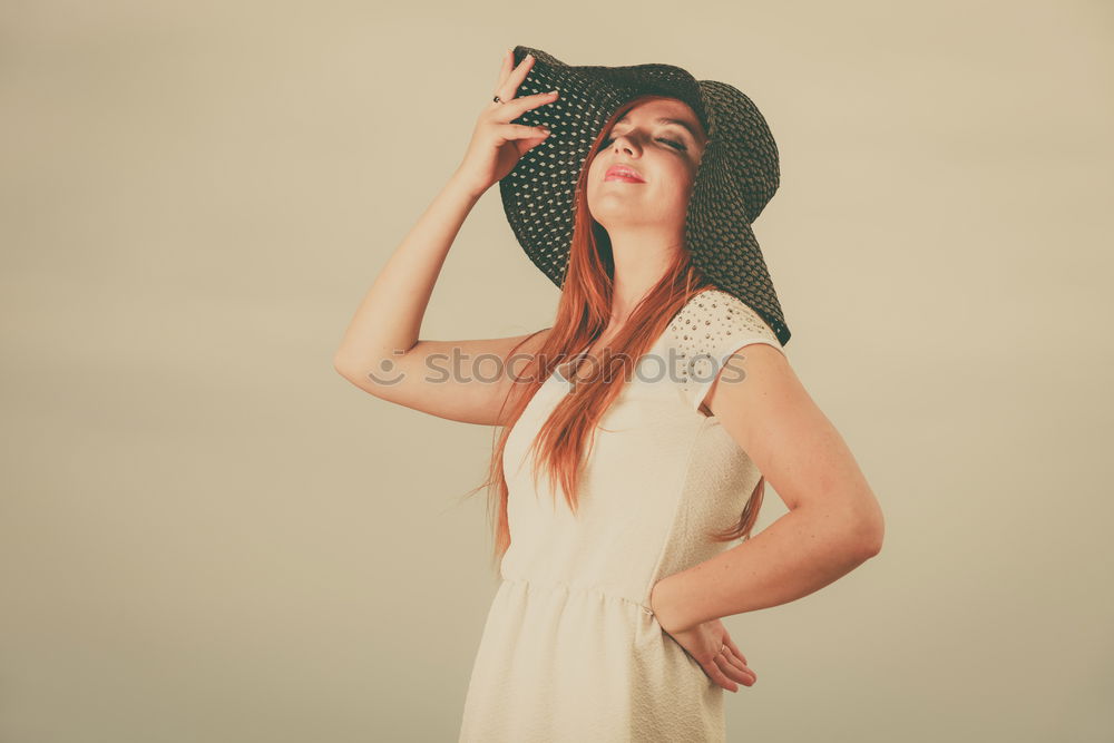 Similar – Image, Stock Photo Young redhead woman with a yellow dress in a yellow room