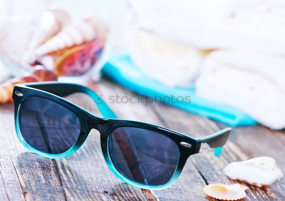 Similar – Image, Stock Photo beige sunglasses on palm leaf, travel concept object