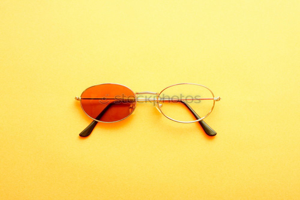 Similar – Image, Stock Photo Top view of green and yellow sunglasses