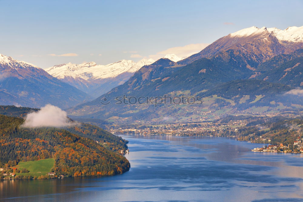 Sunny autumn day on the lake in mountains of south Austria