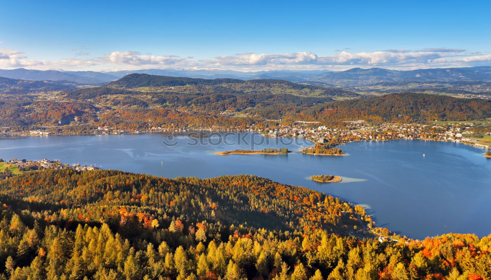 Similar – Sunny autumn day on the lake in mountains of south Austria