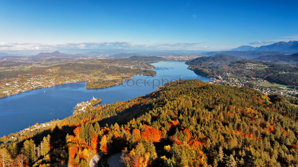 Sunny autumn day on the lake in mountains of south Austria