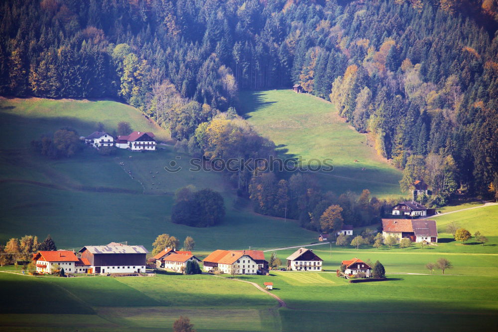 Similar – Austrian village on mountain hills in Alps