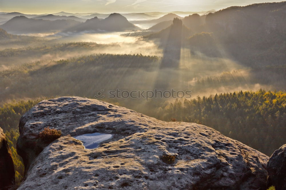 Similar – foggy sunrise in the Elbe Sandstone Mountains