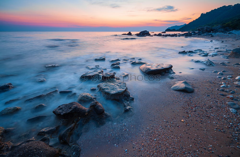 Similar – Rocky coast in the morning light