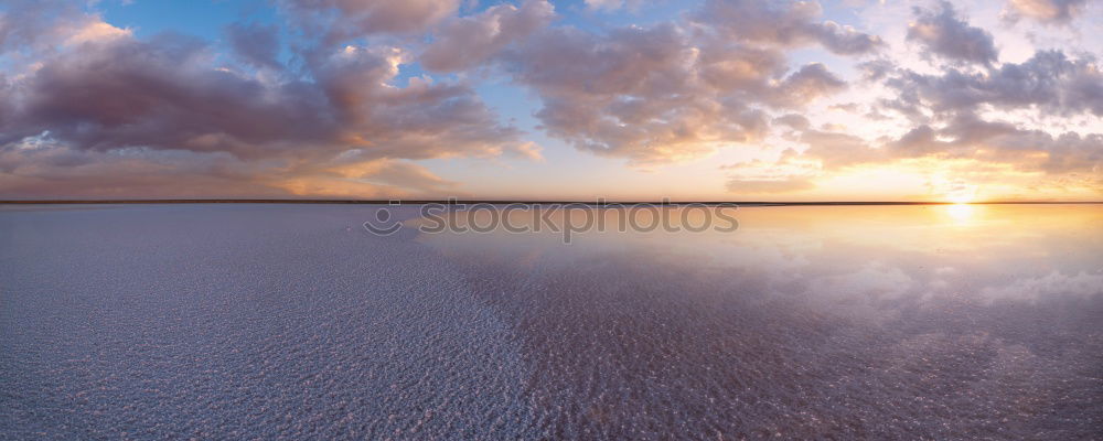 Similar – Warm twilight landscape on a beautifull cloudy sky