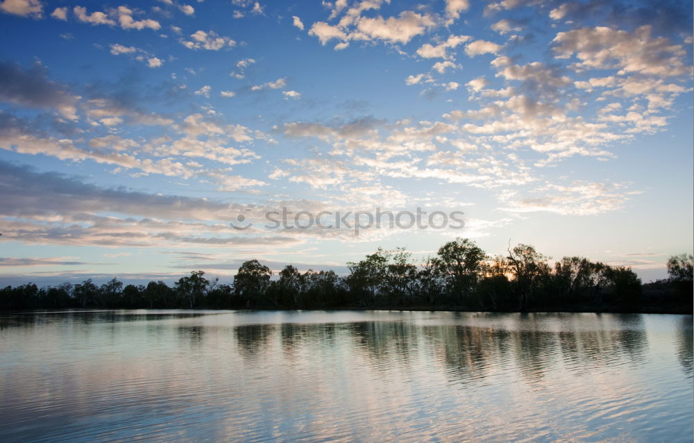 Similar – Tranquil, calm Rhine river scene with arched bridge