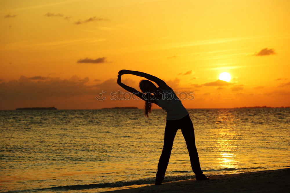 Similar – One happy little girl playing on the beach at the sunset time.