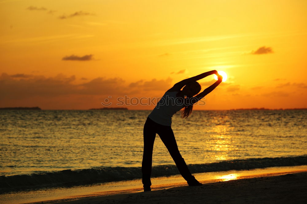 Similar – One happy little girl playing on the beach at the sunset time.