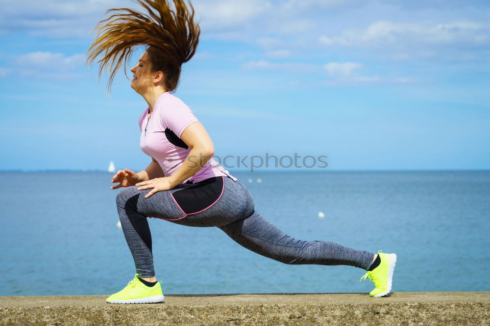 Similar – Image, Stock Photo athletic woman doing her stretching routine