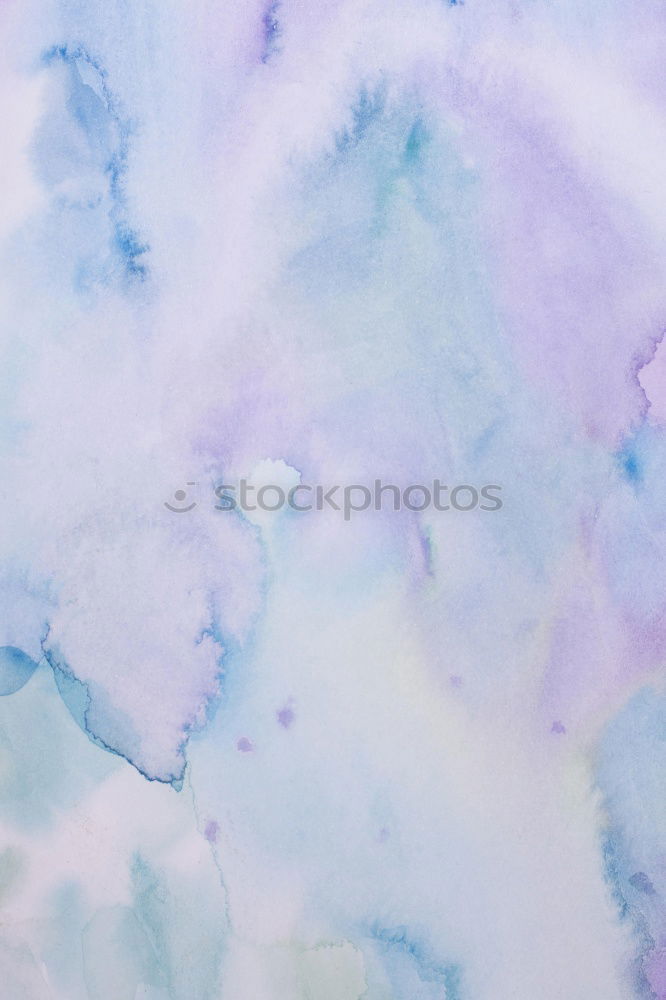 blue and pink watercolor on textured paper background