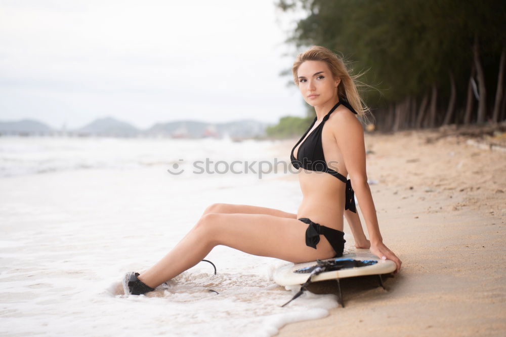 Similar – Young female african athlete on beach with soccer ball