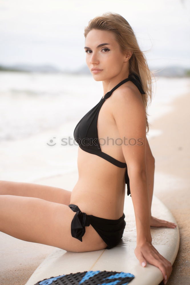 Similar – big woman sitting at the Baltic Sea beach