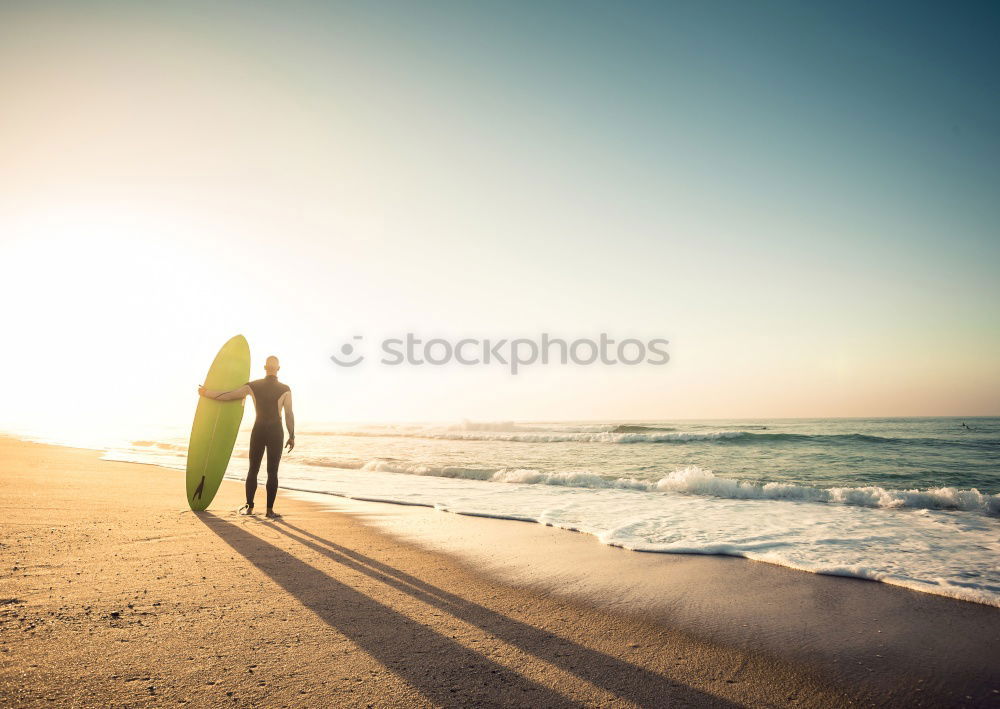 Similar – Father and son playing on the beach at the sunset time. Concept of friendly family.