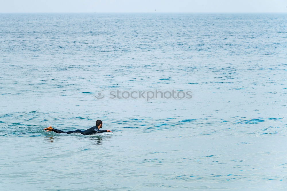 Similar – Image, Stock Photo “Summer” at its best, Fun in the Pacific, Little water bomb in the ocean.