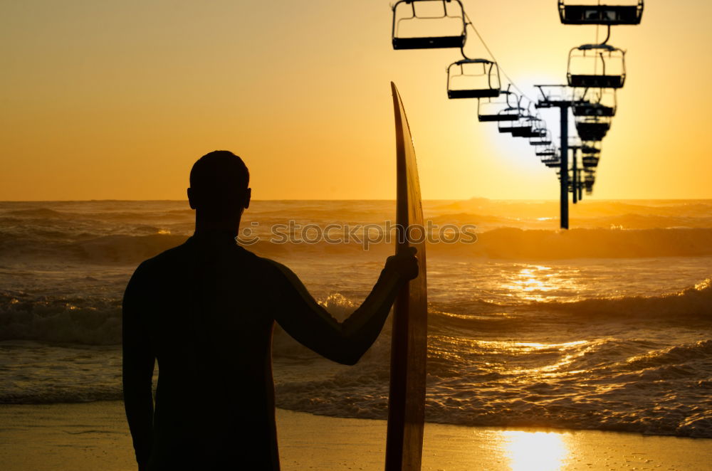 Image, Stock Photo Father and son playing on the beach at the sunset time.