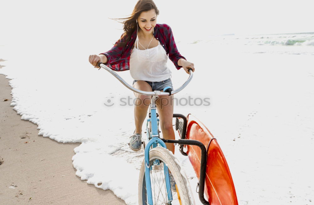 Similar – Group of girls holding surfboard on beach