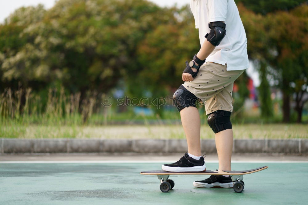 Similar – Boy with skateboard in the park