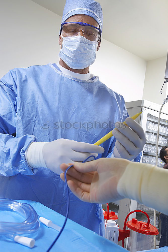 Similar – Image, Stock Photo Team of Surgeons Operating.