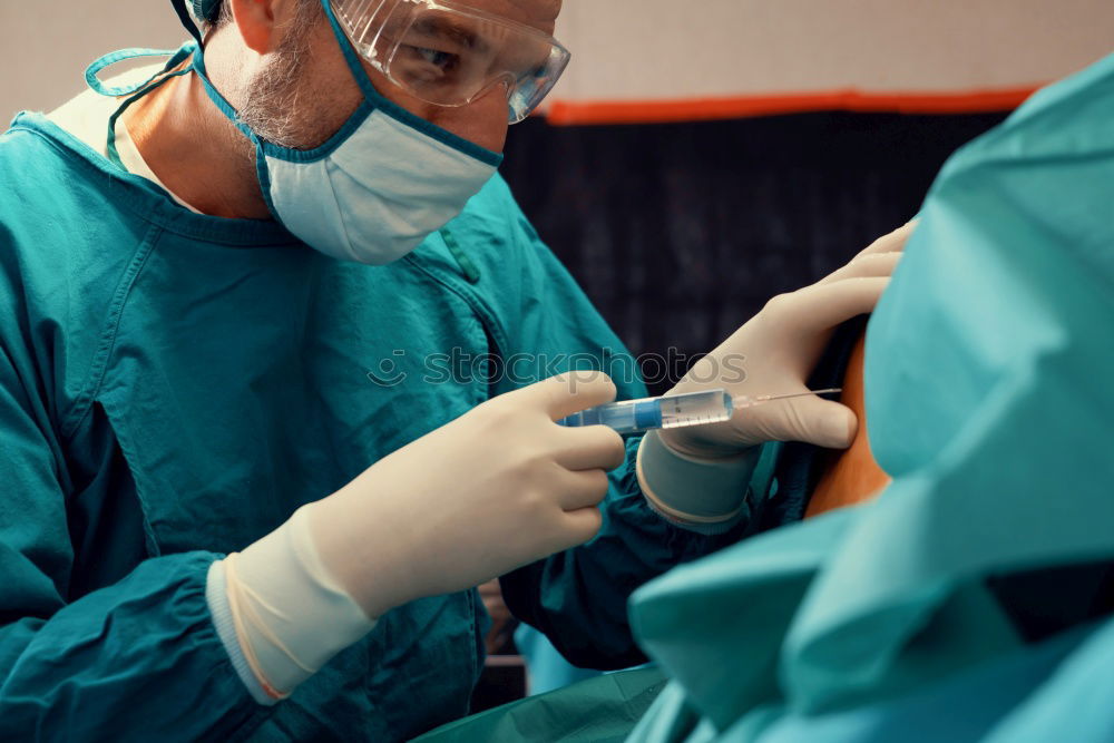 Similar – Image, Stock Photo Team of Surgeons Operating.