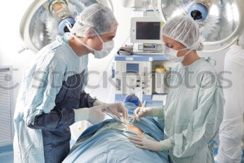 Image, Stock Photo Team of Surgeons Operating