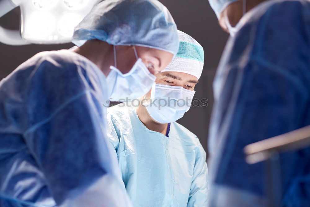 Similar – Team of Surgeons Operating.