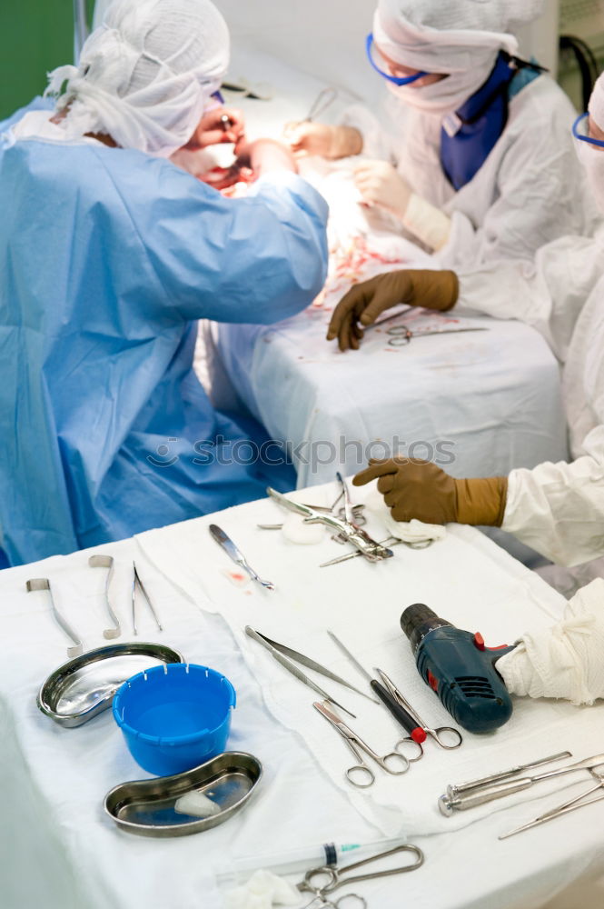 Similar – Image, Stock Photo Team of Surgeons Operating.