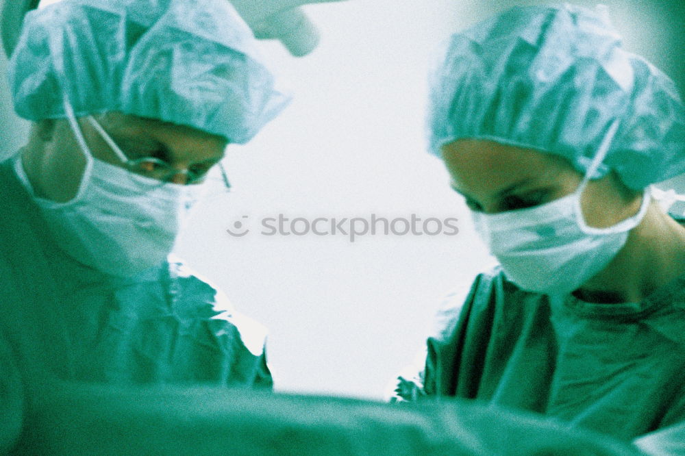 Similar – Team of Surgeons Operating.