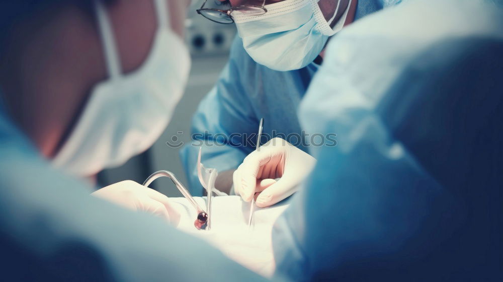 Similar – Image, Stock Photo Team of Surgeons Operating.