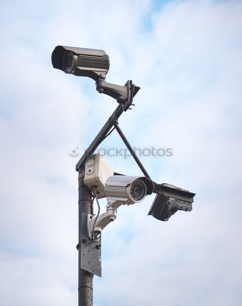 Similar – Real time Modern Online Security CCTV cameras surveillance system. An outdoor video surveillance cameras is installed on a metal post. Equipment system service for safety life or asset.