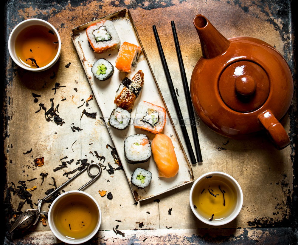 Similar – sushi assortment and soya sauce on black background