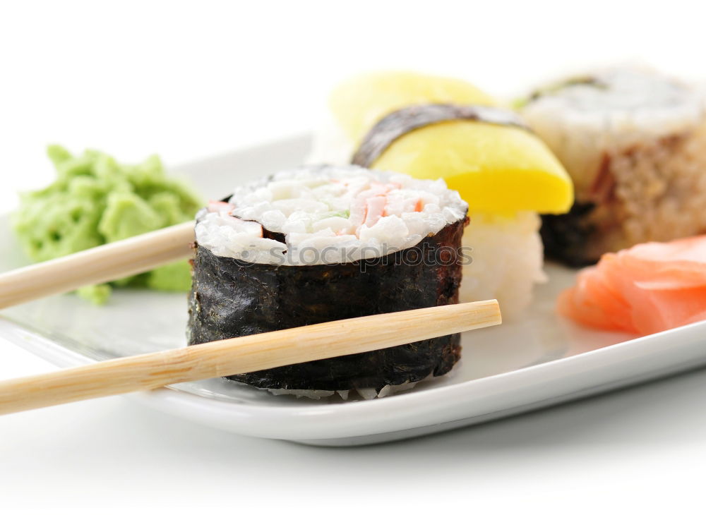 Similar – Image, Stock Photo Sushi set on pottery plate with chopsticks and soy sauce