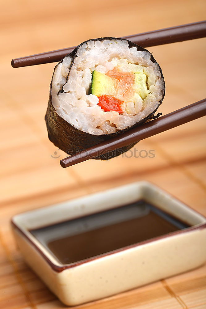 Similar – Sushi maki rolls on a tray