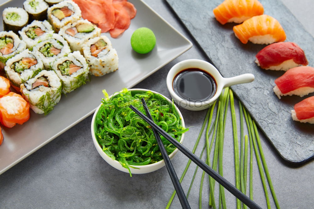 Similar – Crop woman eating sushi