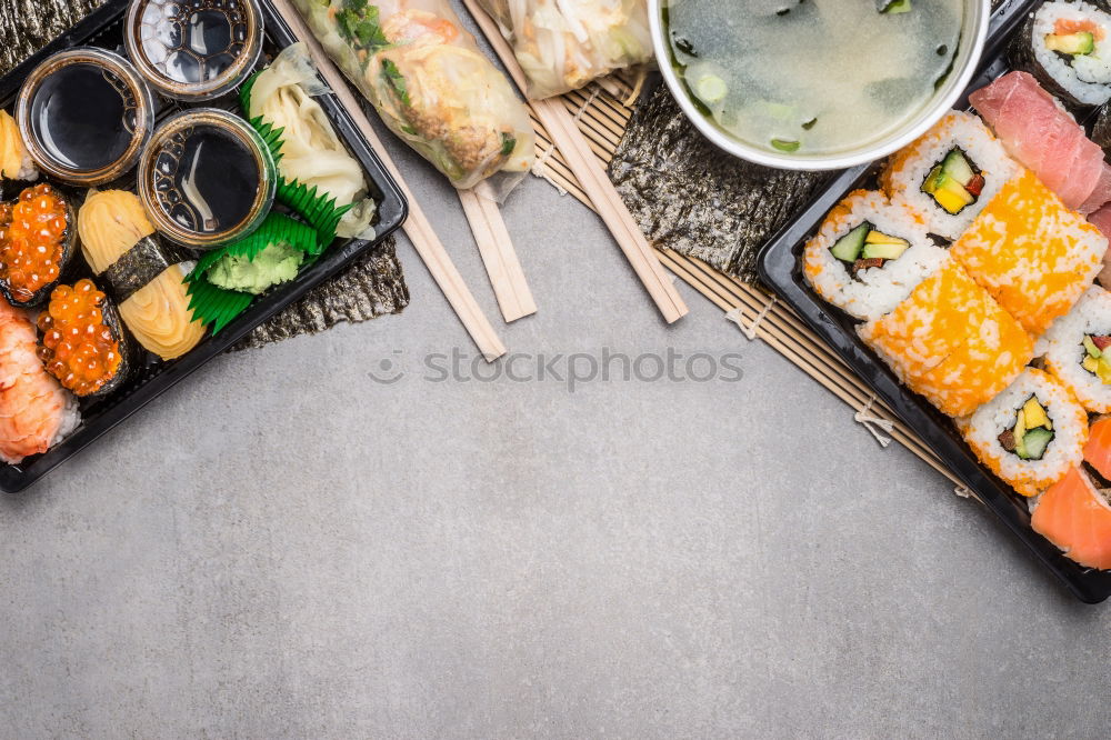 Similar – Crop woman eating sushi