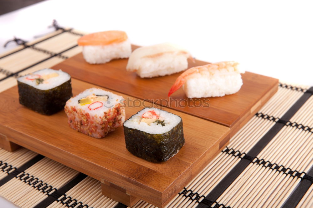 Similar – Sushi maki rolls on a tray