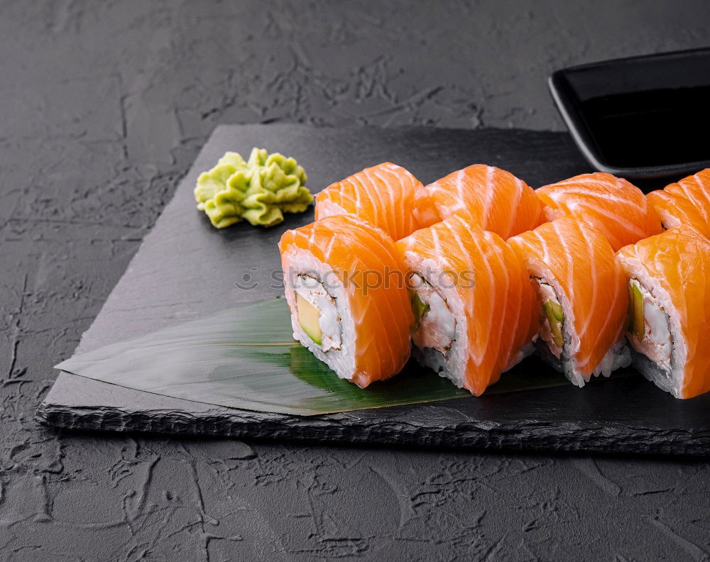 Similar – Image, Stock Photo Sushi maki rolls and sashimi on a wooden background