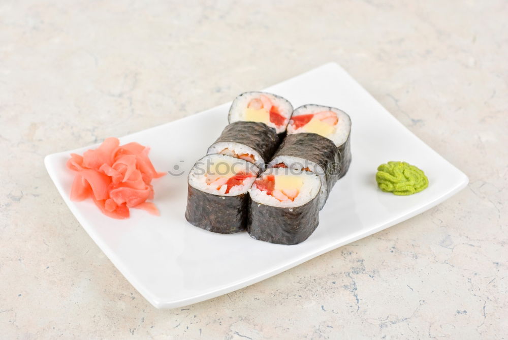 Similar – sushi assortment in white plate on black background