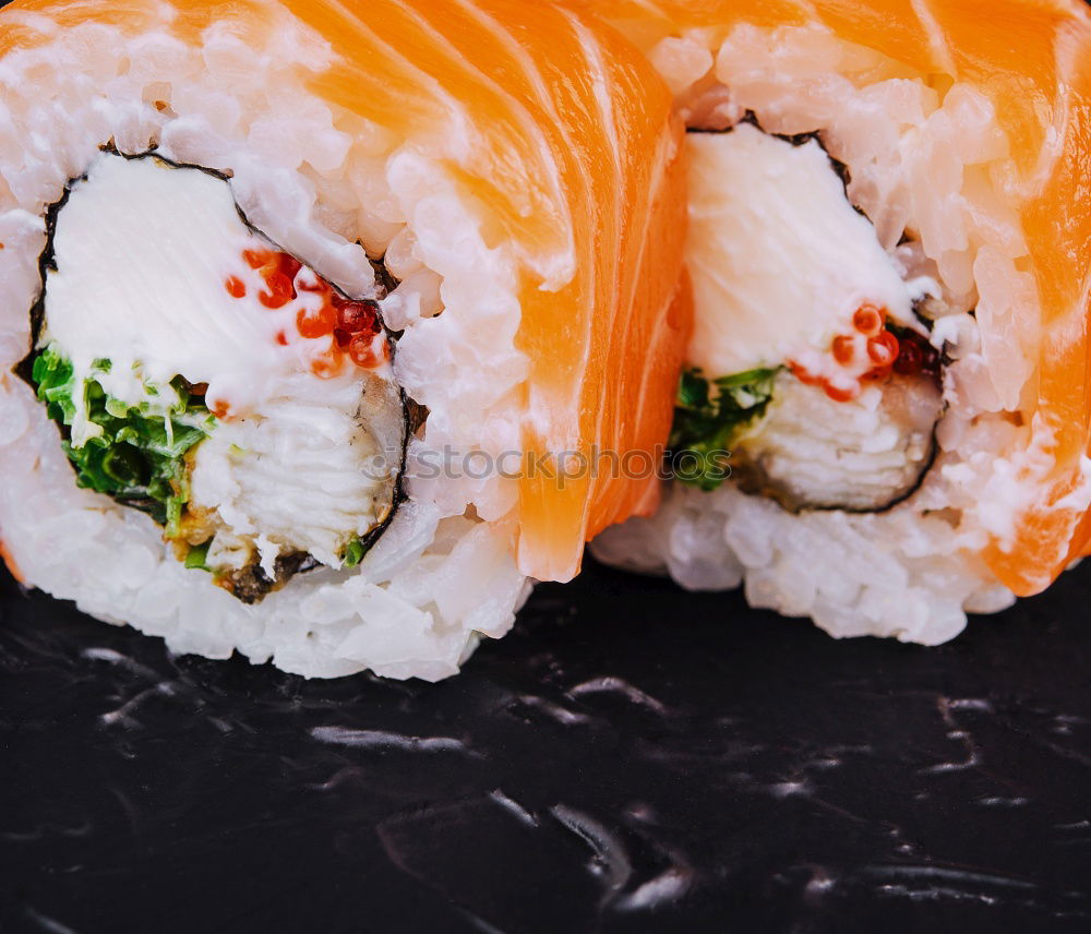 Similar – Crop woman eating sushi