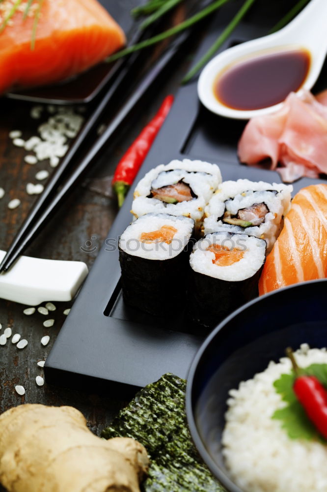 Similar – Crop woman eating sushi